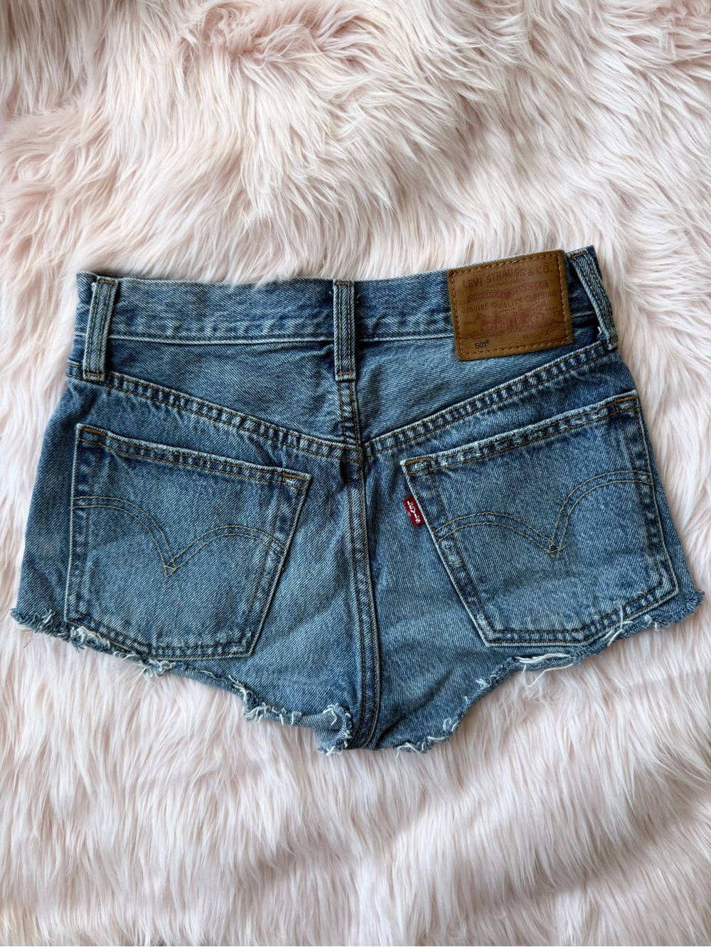 Levi's Premium Waterless Medium Blue Denim Cutoff Raw Hem Shorts Size 24